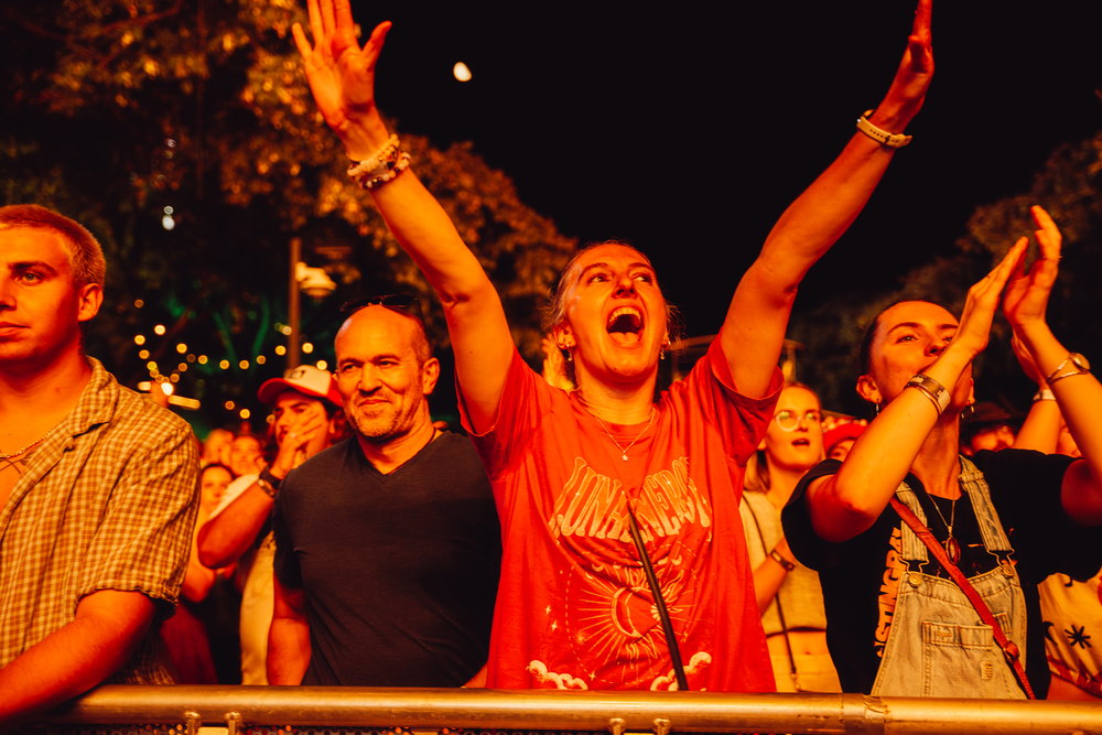 Festival audience on the Cultural Forecourt during King Stingray's On the Banks set, 2026 season